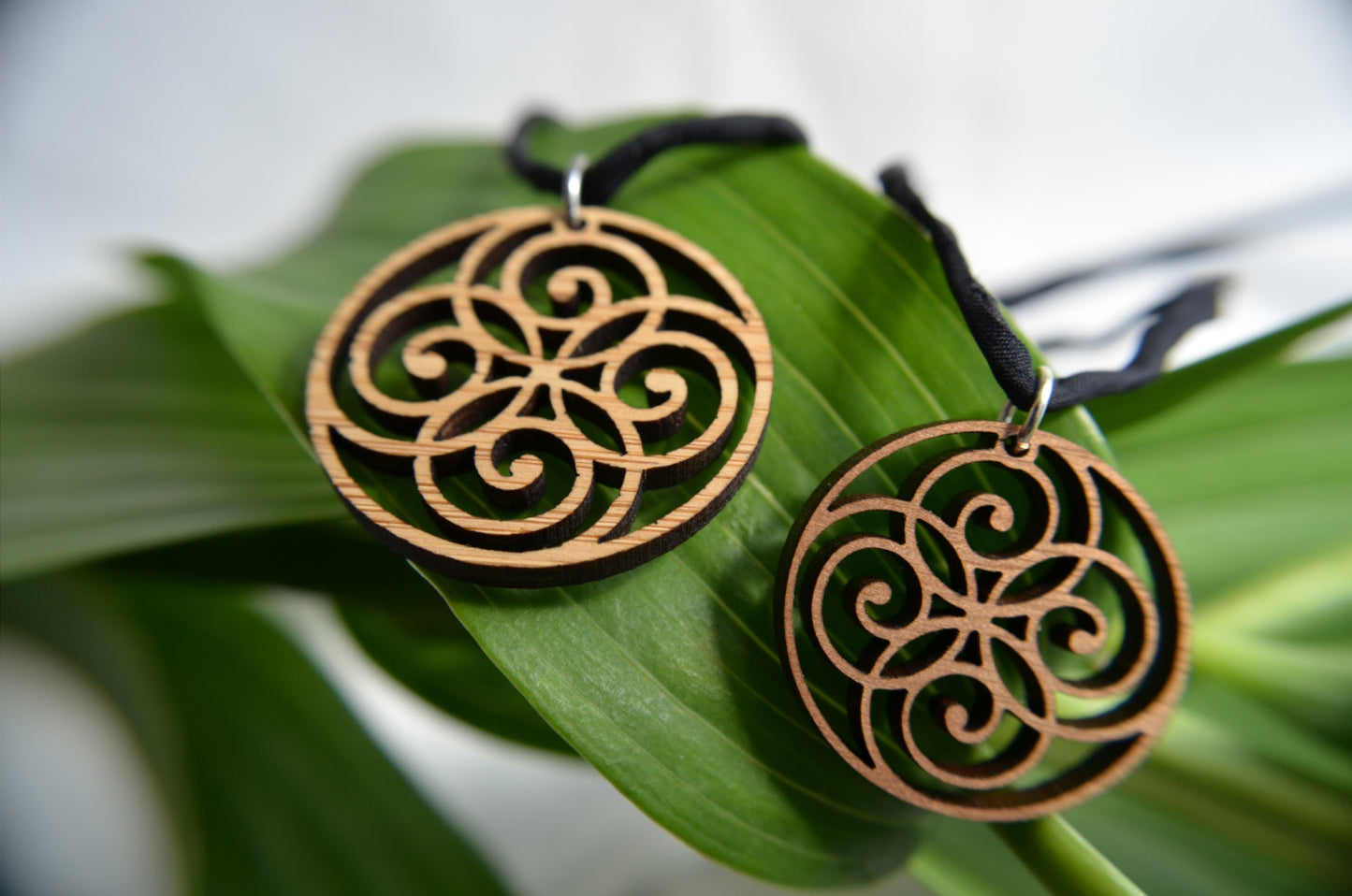Spiral Circle Pendant in wood on leather cord